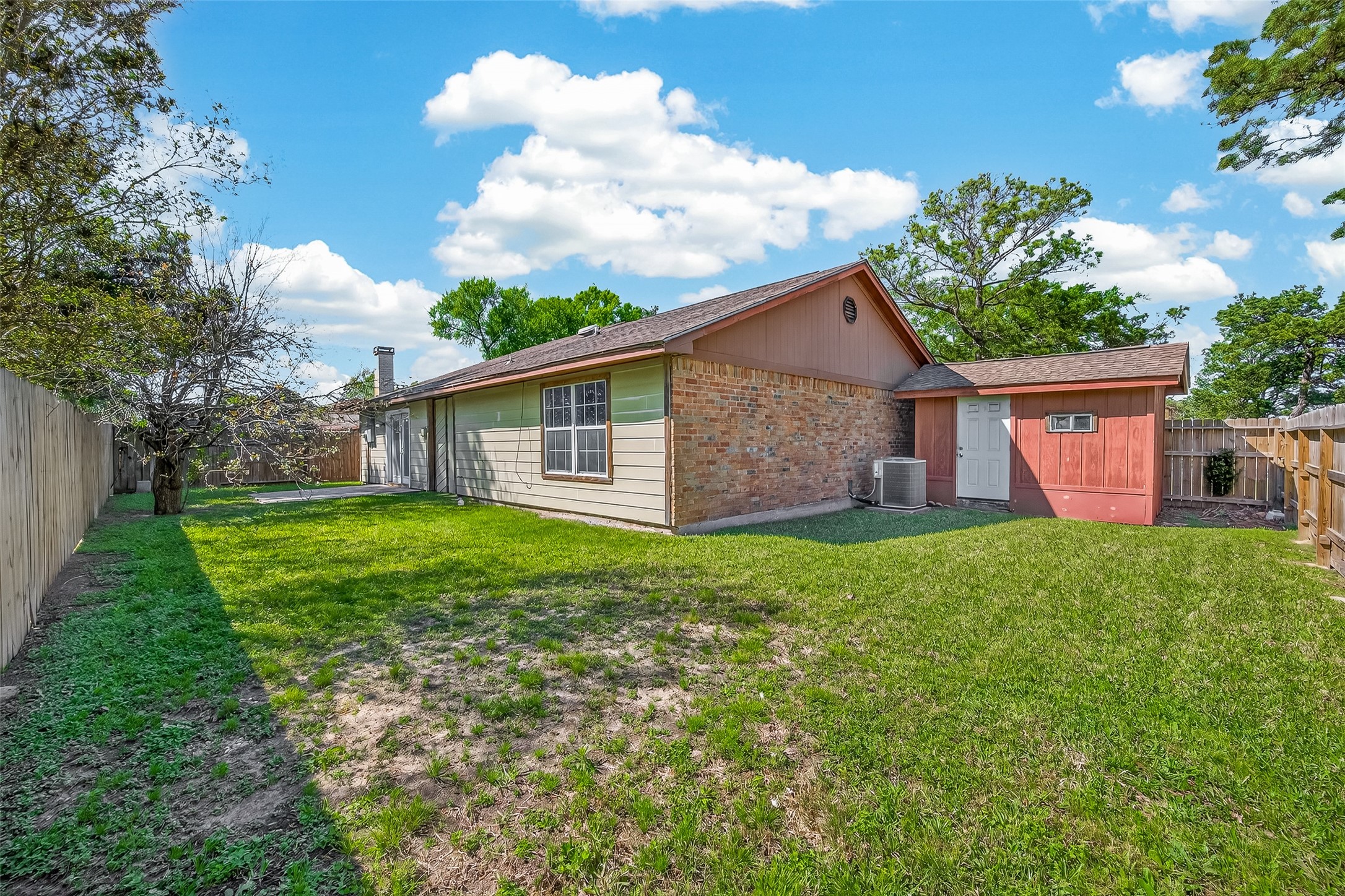 9503 Turtle Log Trail Houston, TX 77064 - Photo 39 of 41 a view of a house with yard and a garden