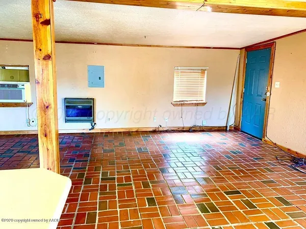 a view of a brick building with an outdoor space