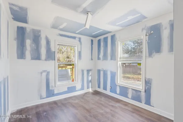 a view of entryway with wooden floor