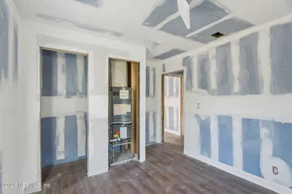 a view of a livingroom with furniture and window