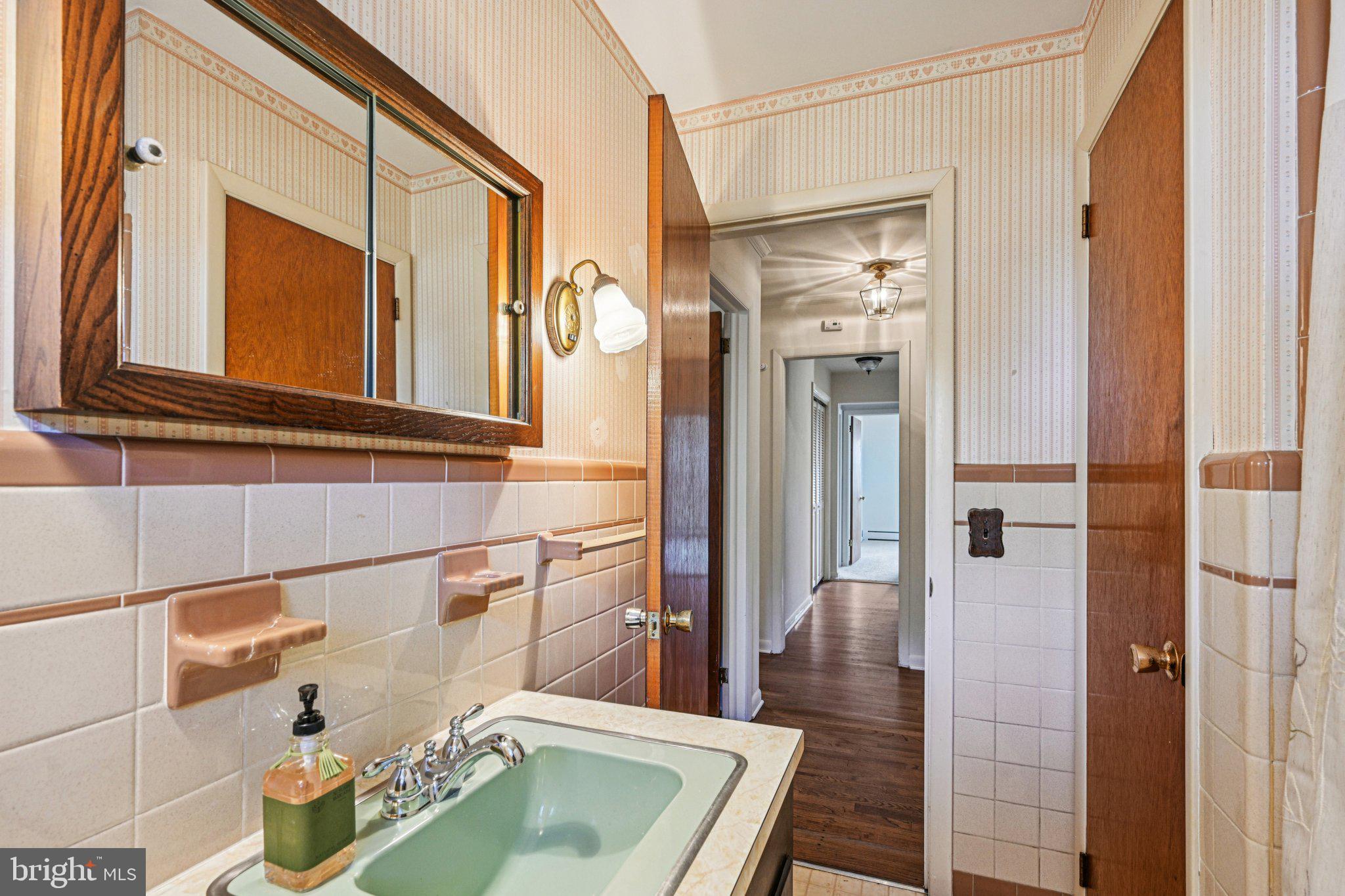 12 Jennings Road Medford, NJ 08055 - Photo 28 of 48 a bathroom with a sink a bathtub and shower