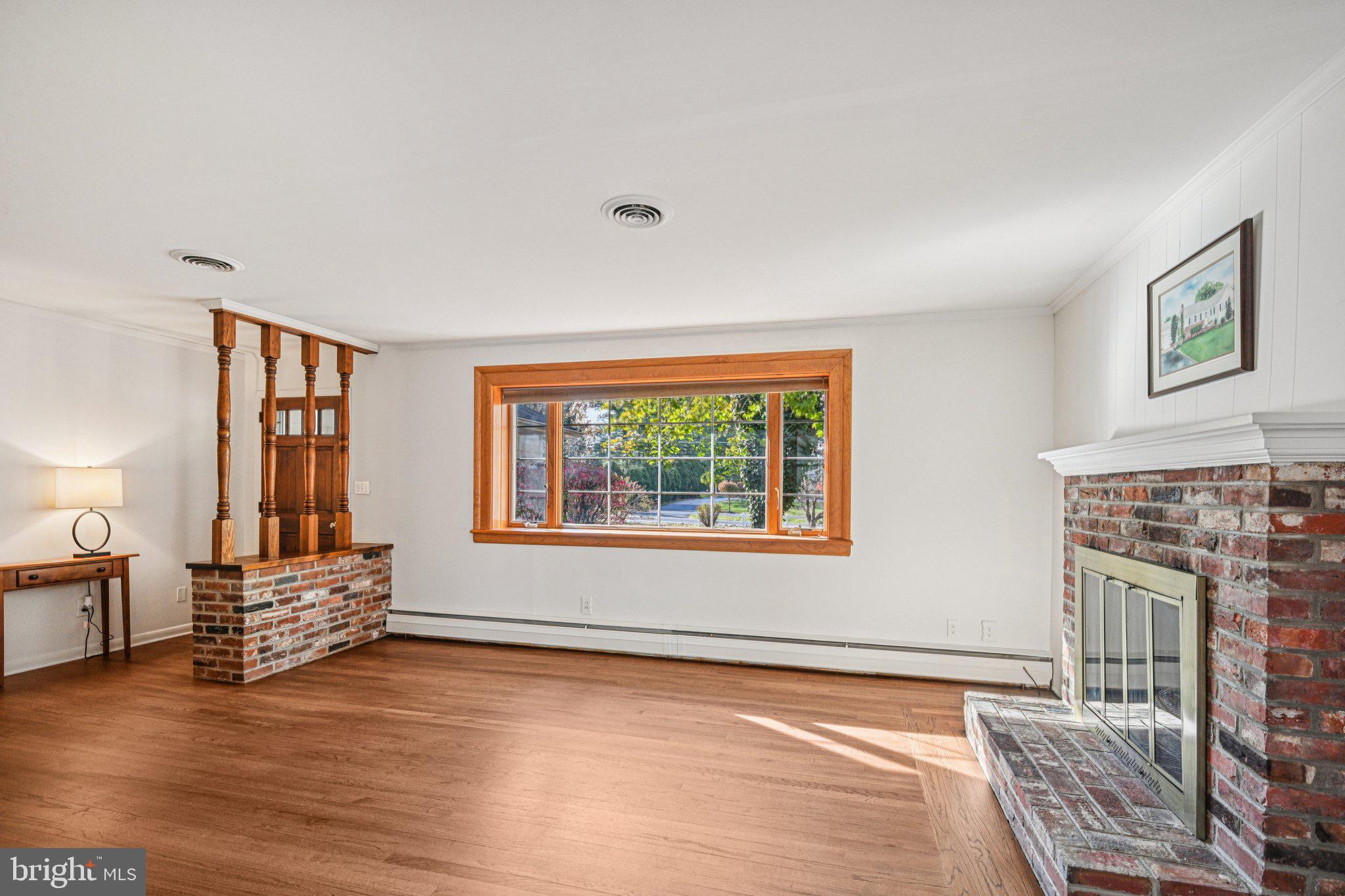 12 Jennings Road Medford, NJ 08055 - Photo 8 of 48 a living room with furniture and a fireplace