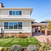 a house view with a garden space