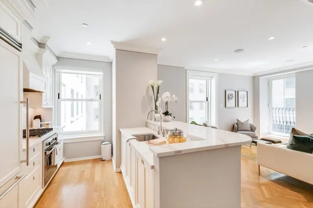 a view of a bathroom with dual sinks