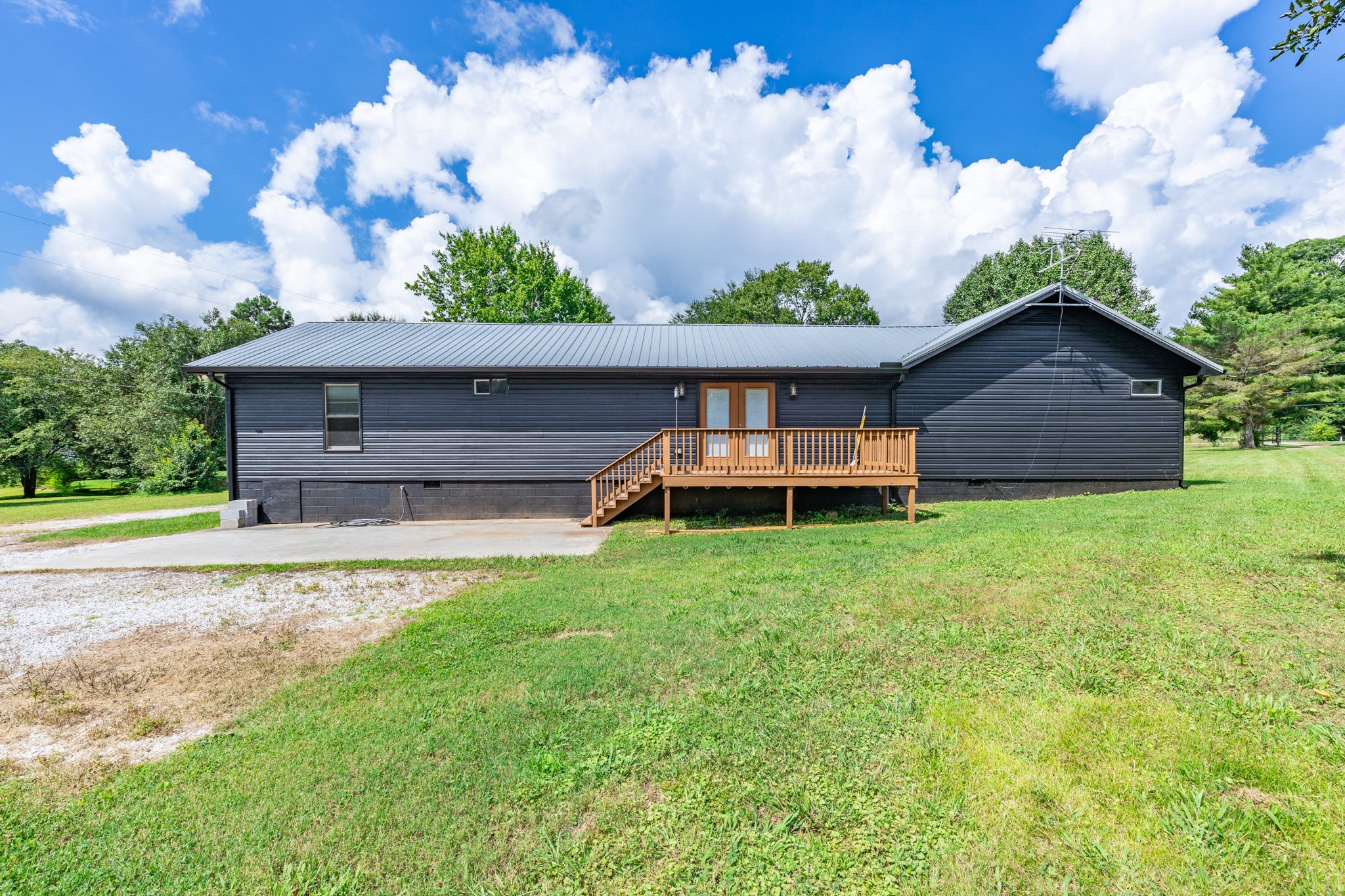 340 Old Spring Creek Road Estill Springs, TN 37330 - Photo 34 of 60 a front view of a house with a yard
