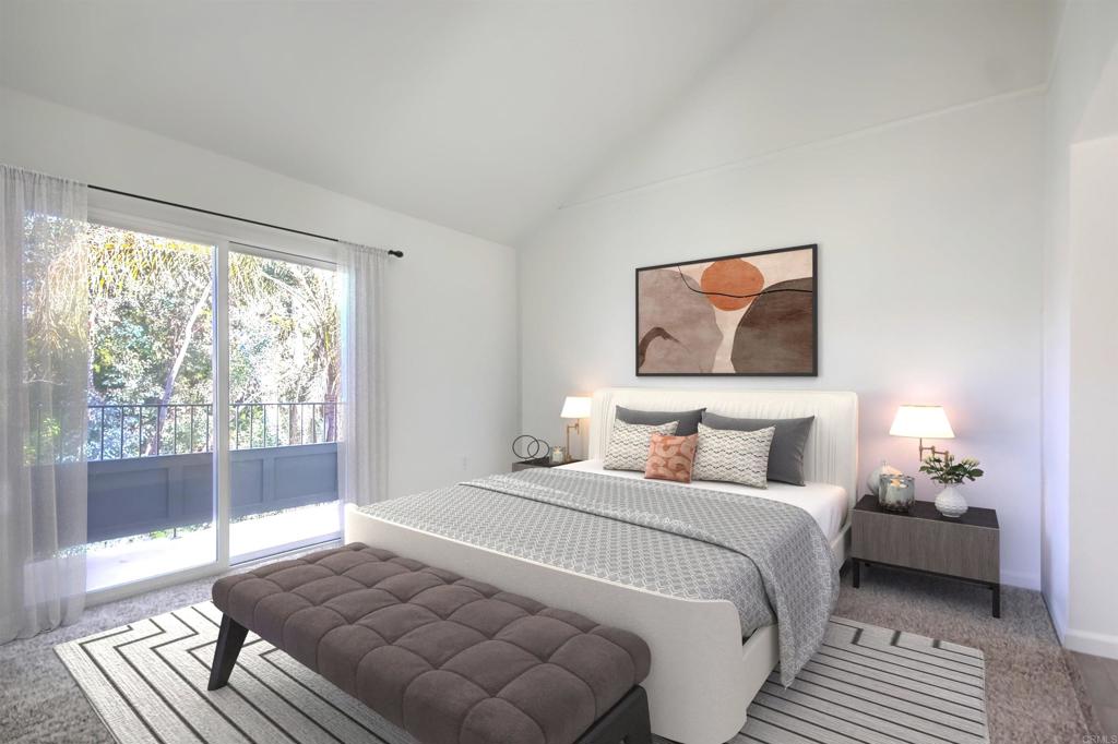 8702 Spring Canyon Drive Spring Valley, CA 91977 - Photo 9 of 22 a bedroom with a bed and a large window