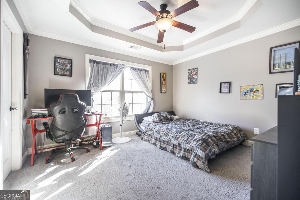 4065 Gordon Road Abbeville, GA 31001 - Photo 30 of 48 a bedroom that has a bed and a window