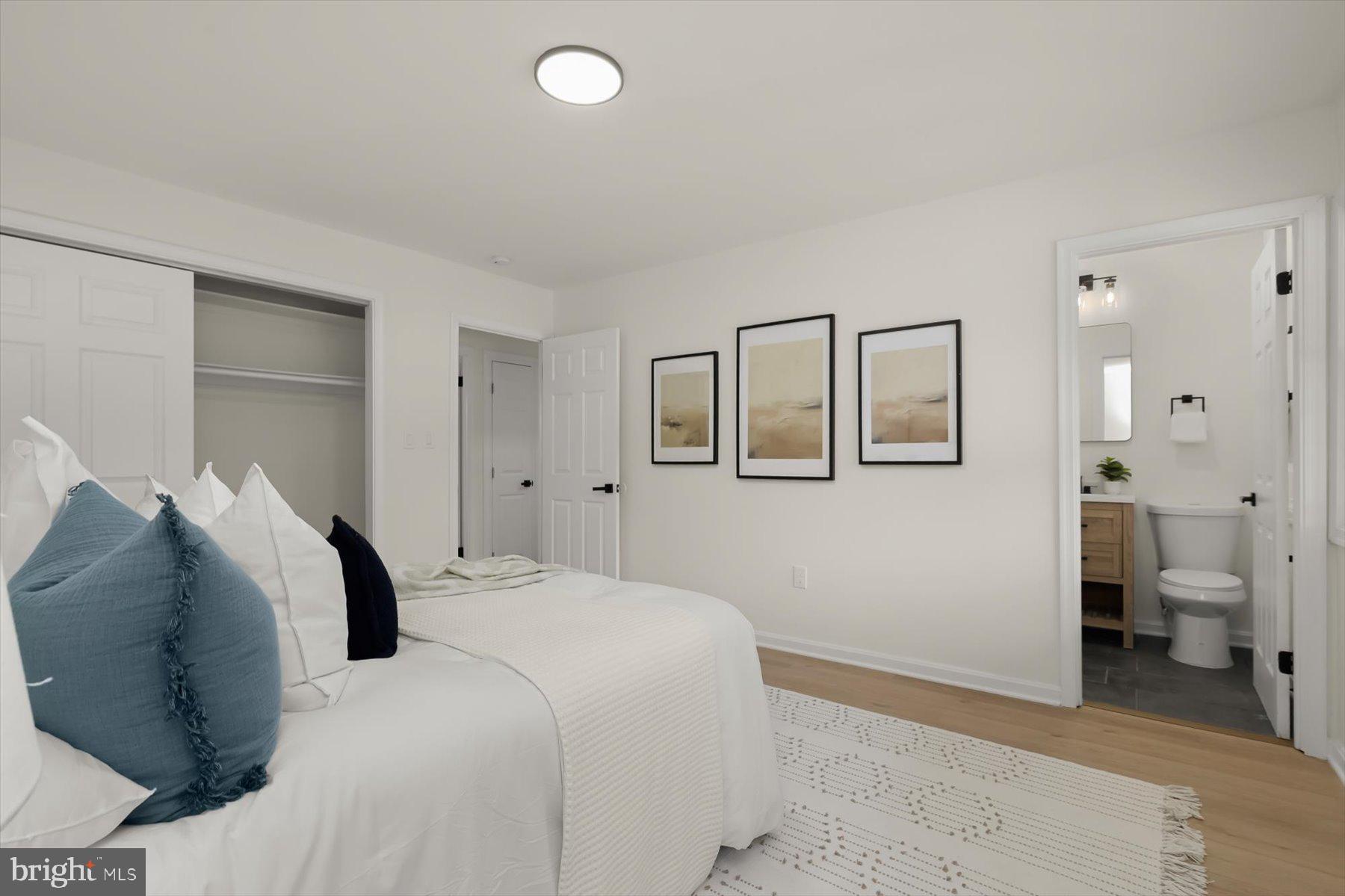 2025 Greengage Road Windsor Mill, MD 21244 - Photo 15 of 28 a bedroom with a bed and a couch