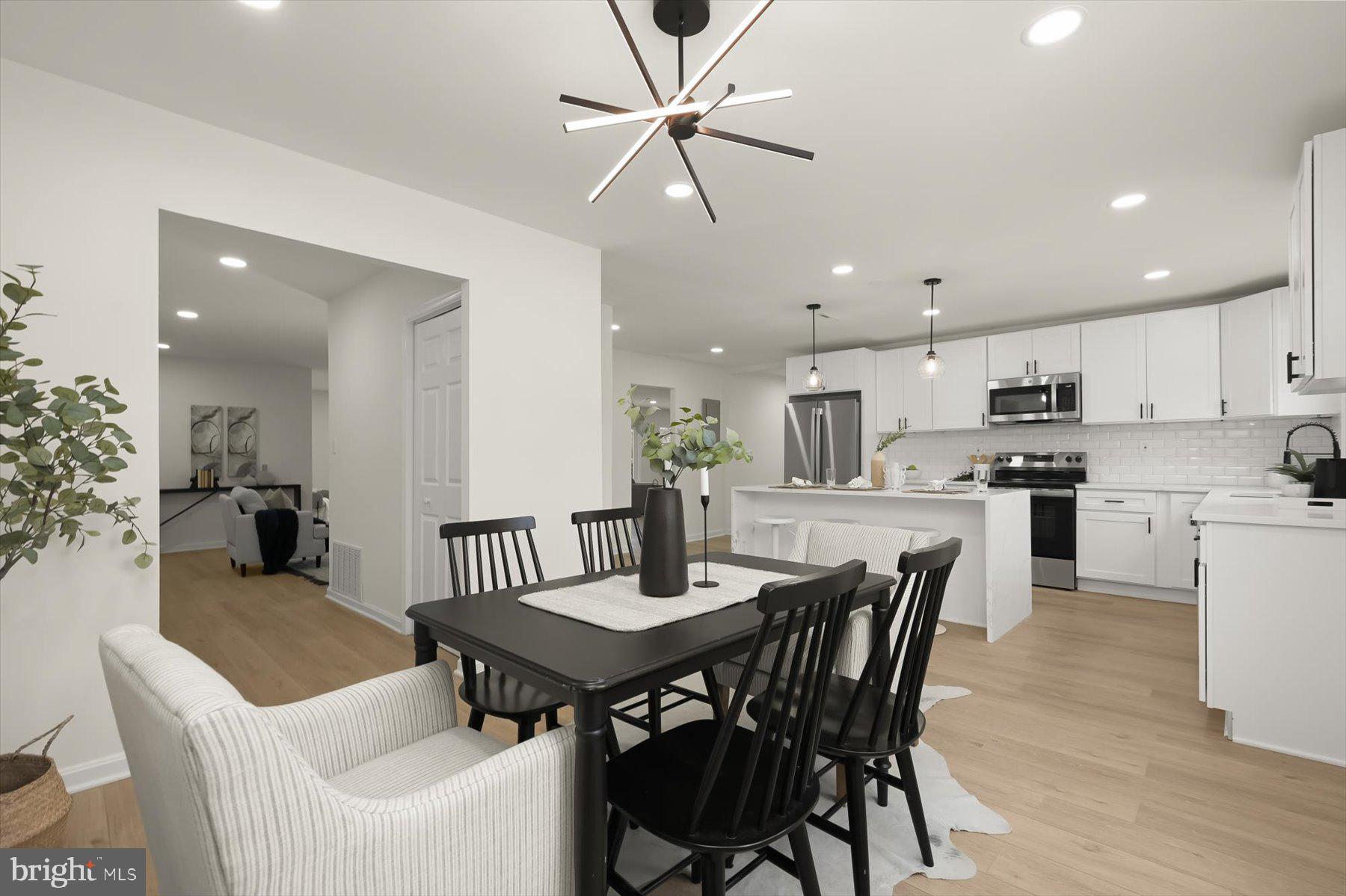 2025 Greengage Road Windsor Mill, MD 21244 - Photo 8 of 28 a view of a dining room with furniture
