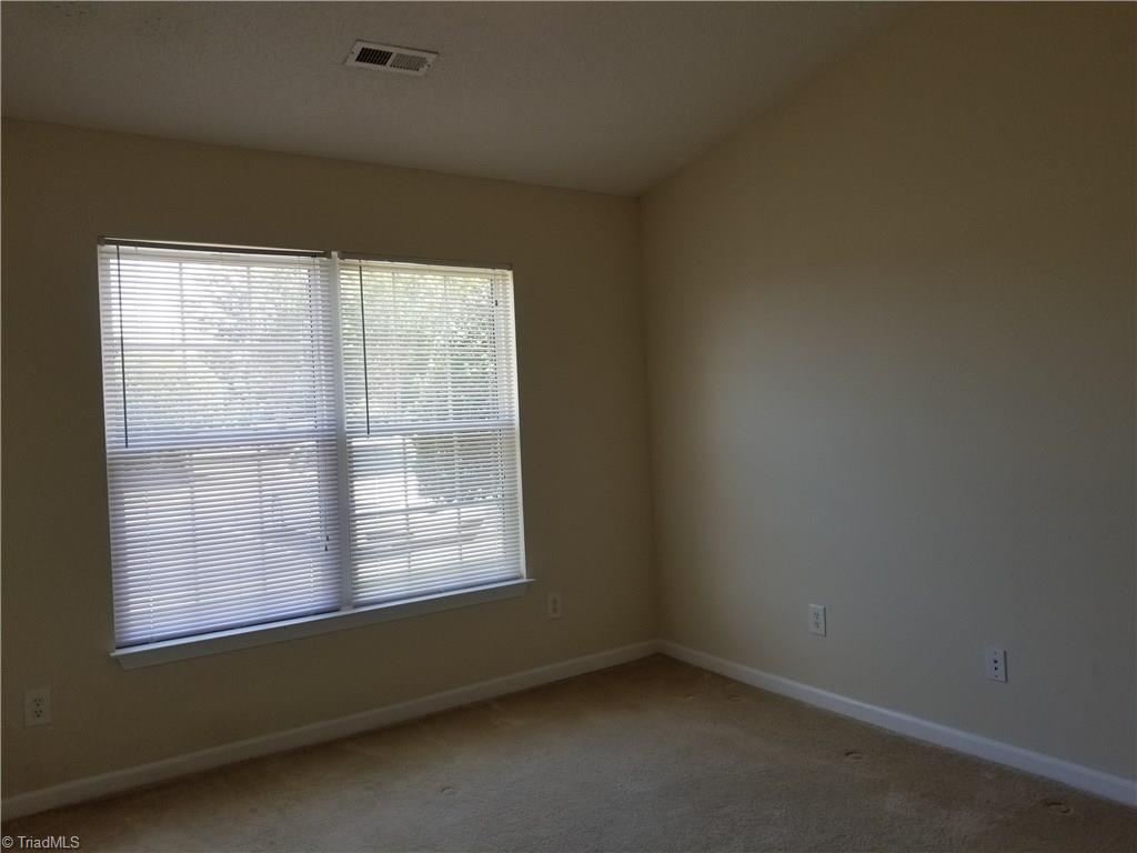 2940 WaterStone Loop High Point, NC 27265 - Photo 11 of 16 In this split bedroom plan, the 2nd bedroom is located in the front of the home with the full bathroom located directly across the hall.