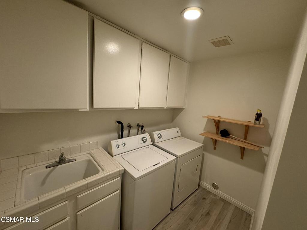 13654 Blacksmith Court Moorpark, CA 93021 - Photo 15 of 34 a utility room with dryer and washer