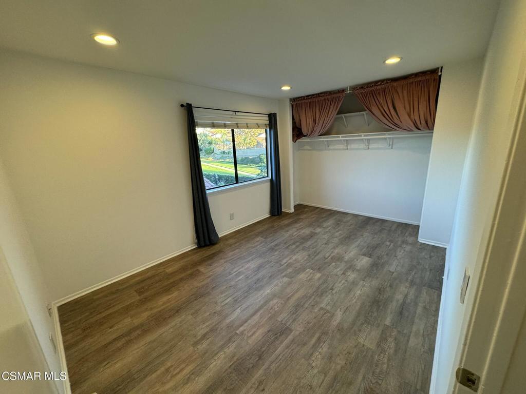 13654 Blacksmith Court Moorpark, CA 93021 - Photo 22 of 34 a view of an empty room with a fireplace