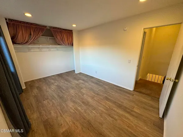 a bathroom with a double vanity sink mirror and shower