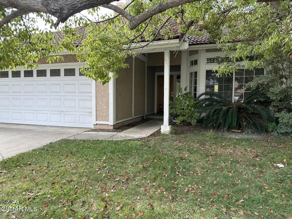 13654 Blacksmith Court Moorpark, CA 93021 - Photo 3 of 34 a view of house with backyard and glass windows