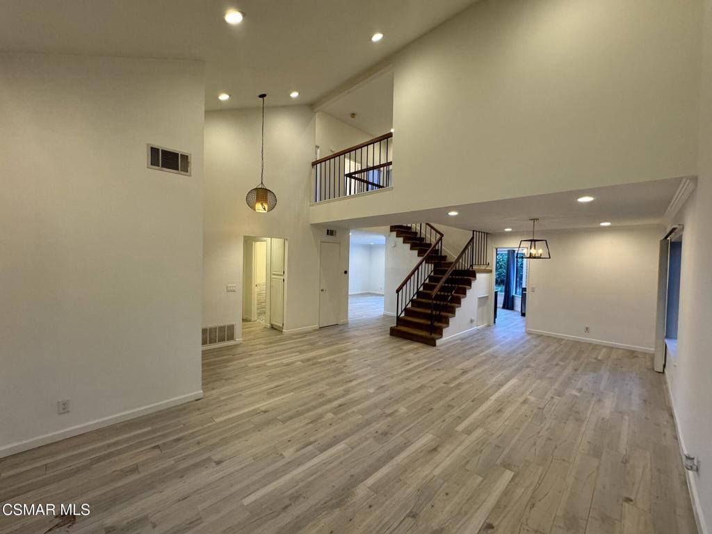 13654 Blacksmith Court Moorpark, CA 93021 - Photo 5 of 34 a view of a room with gym equipment and a window