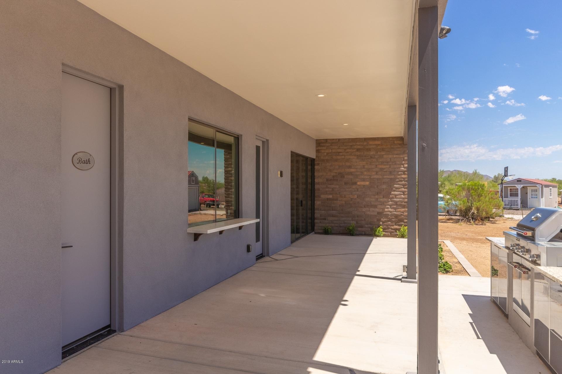 1045 East Joy Ranch Road Phoenix, AZ 85086 - Photo 34 of 39 EXTENDED COVERED PATIO
