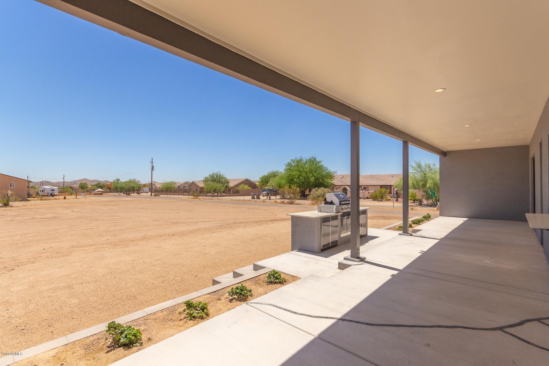 1045 East Joy Ranch Road Phoenix, AZ 85086 - Photo 35 of 39 EXTENDED COVERED PATIO