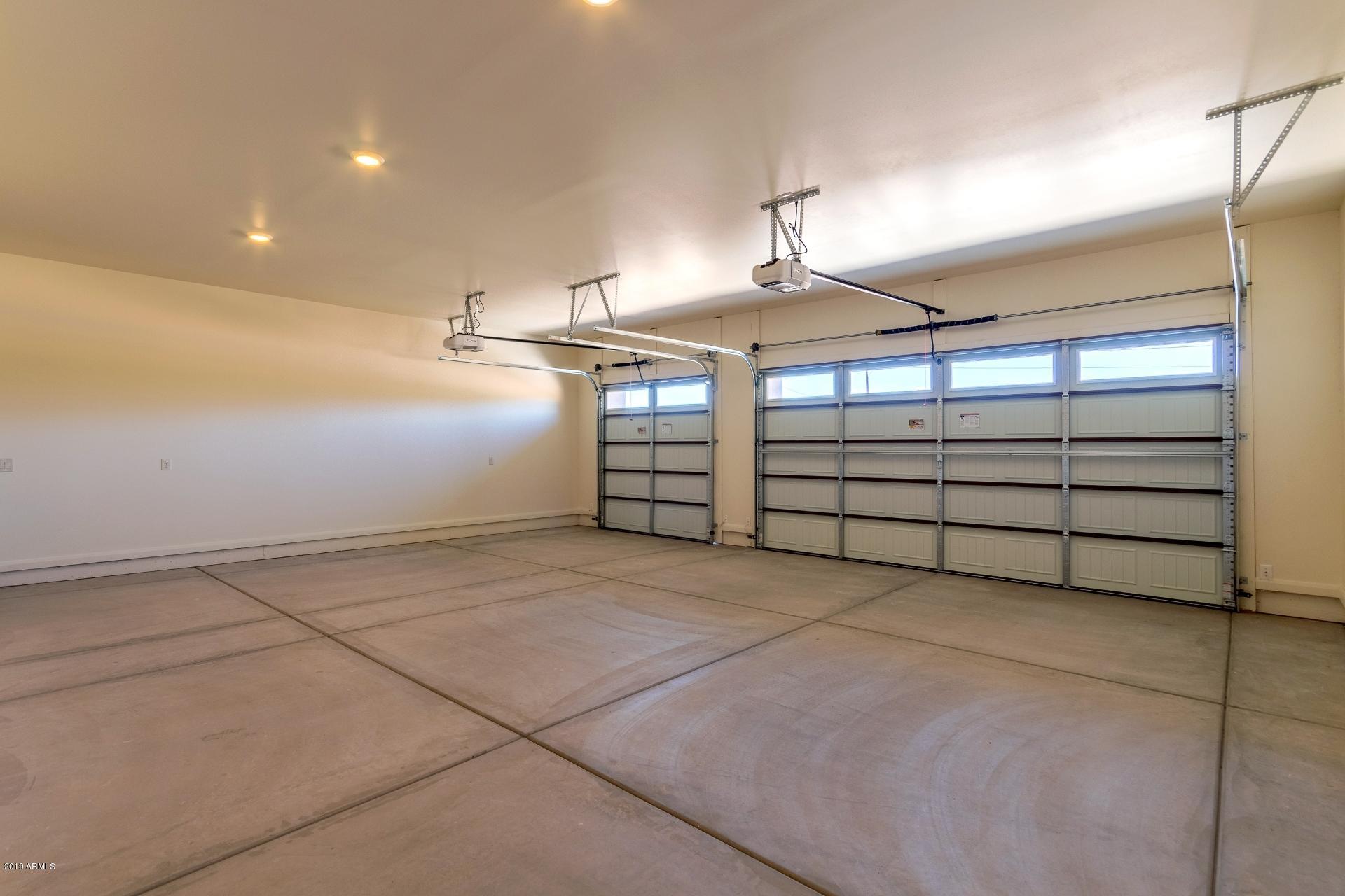 1045 East Joy Ranch Road Phoenix, AZ 85086 - Photo 38 of 39 EXTENDED 3-CAR GARAGE