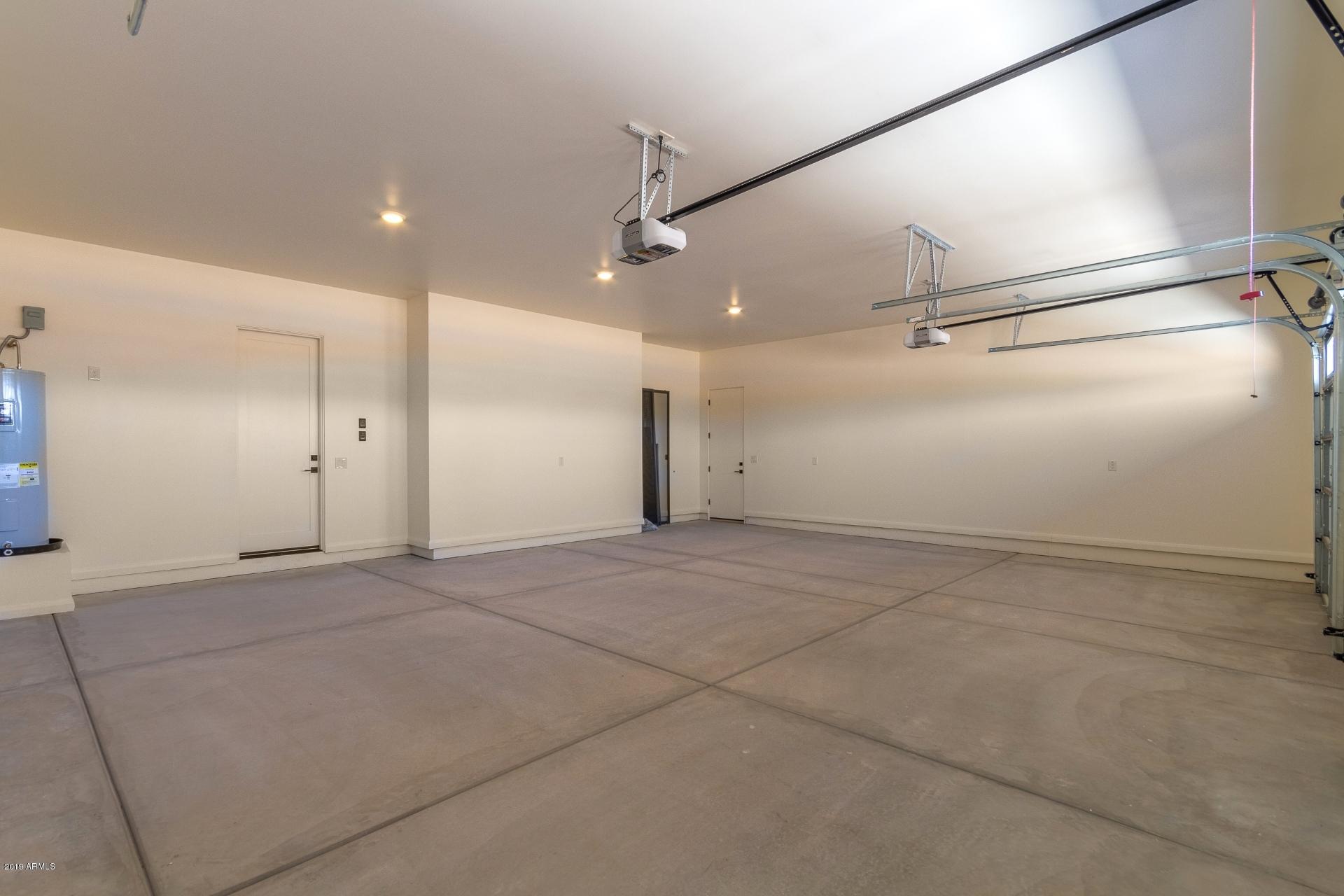 1045 East Joy Ranch Road Phoenix, AZ 85086 - Photo 39 of 39 EXTENDED 3-CAR GARAGE