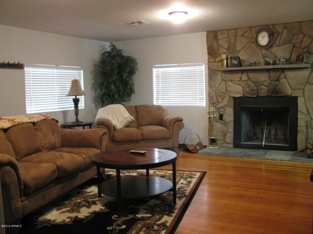7424 South Russell Road Globe, AZ 85501 - Photo 3 of 30 Living Room with original Fireplace