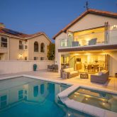 a view of a house with a swimming pool