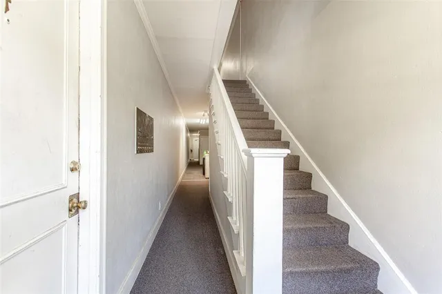 a view of hallway with stairs