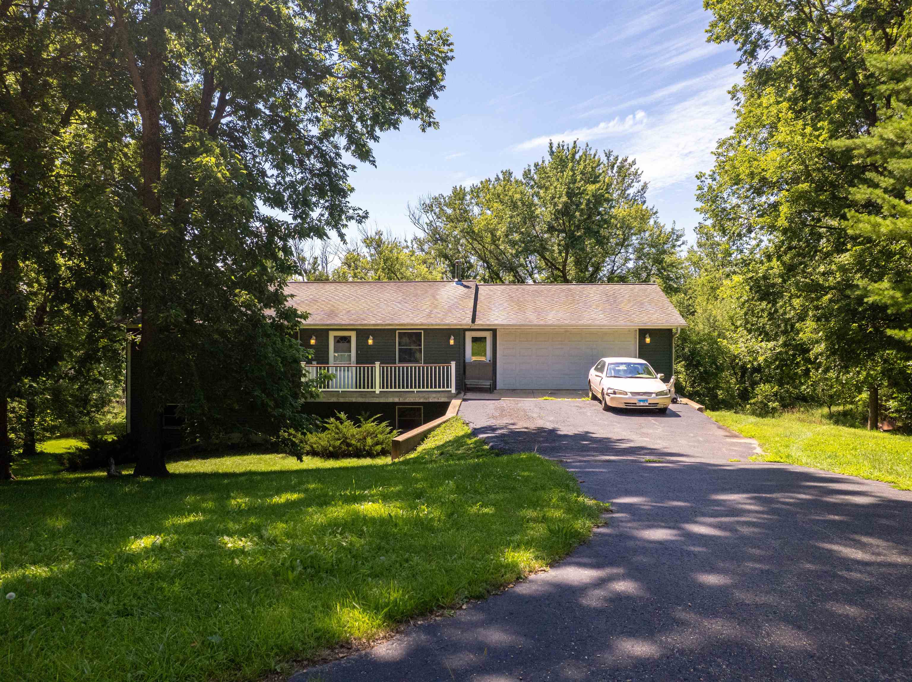 1912 Daysville Road Oregon, IL 61061 - Photo 1 of 74 a view of a house with backyard porch and sitting area