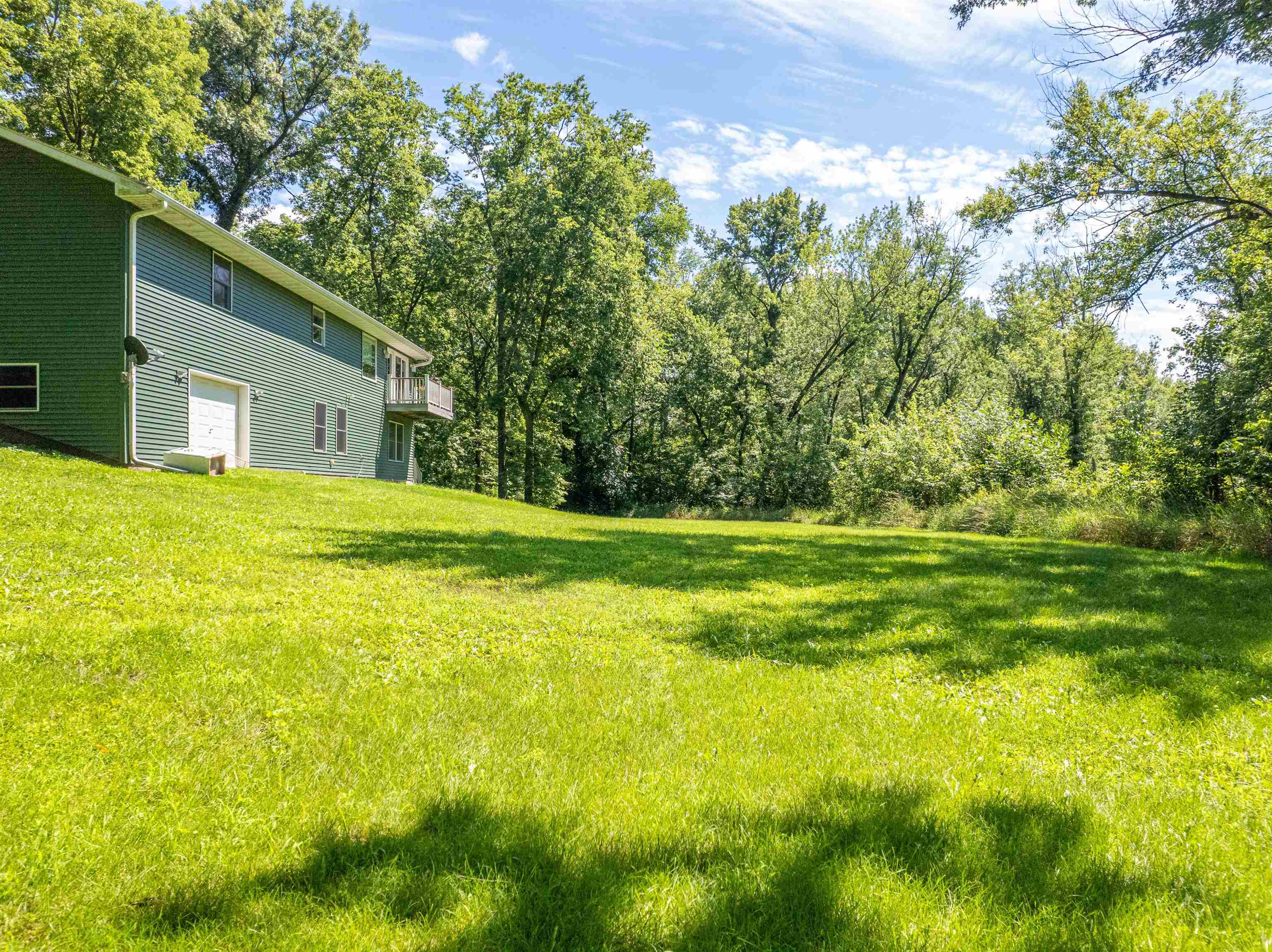 1912 Daysville Road Oregon, IL 61061 - Photo 12 of 74 a view of a house with a big yard