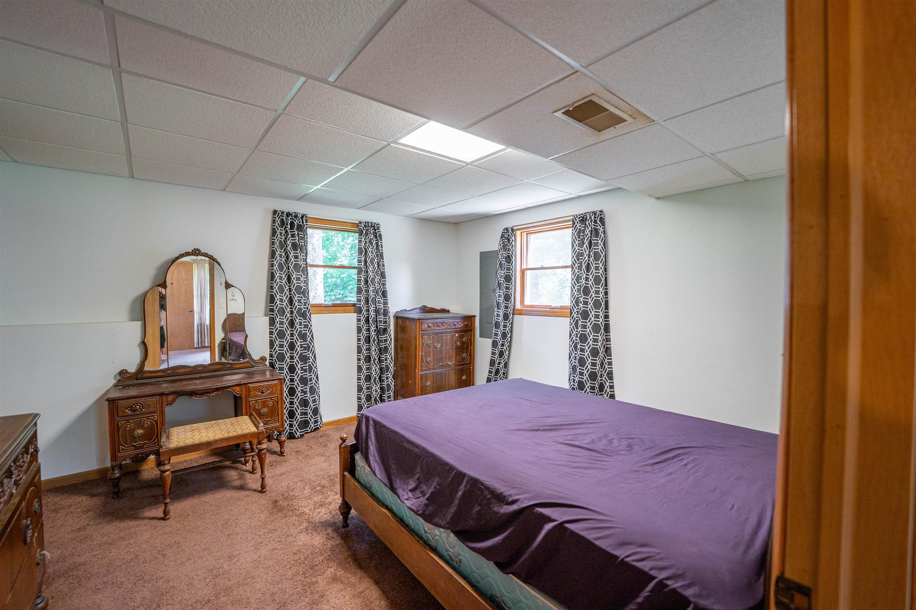 1912 Daysville Road Oregon, IL 61061 - Photo 41 of 74 a bedroom with a bed a table and windows