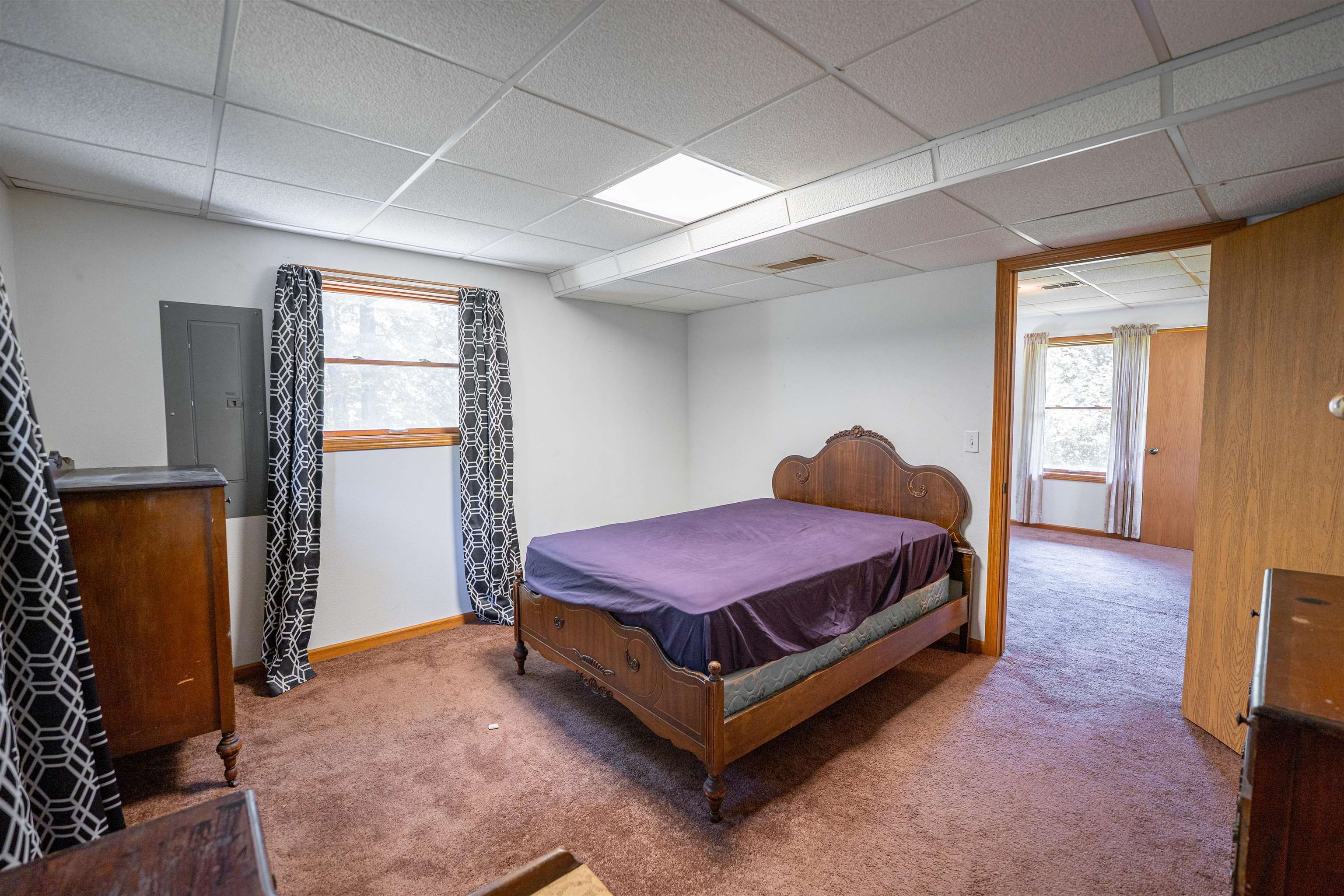 1912 Daysville Road Oregon, IL 61061 - Photo 42 of 74 a spacious bedroom with a bed and wooden floor