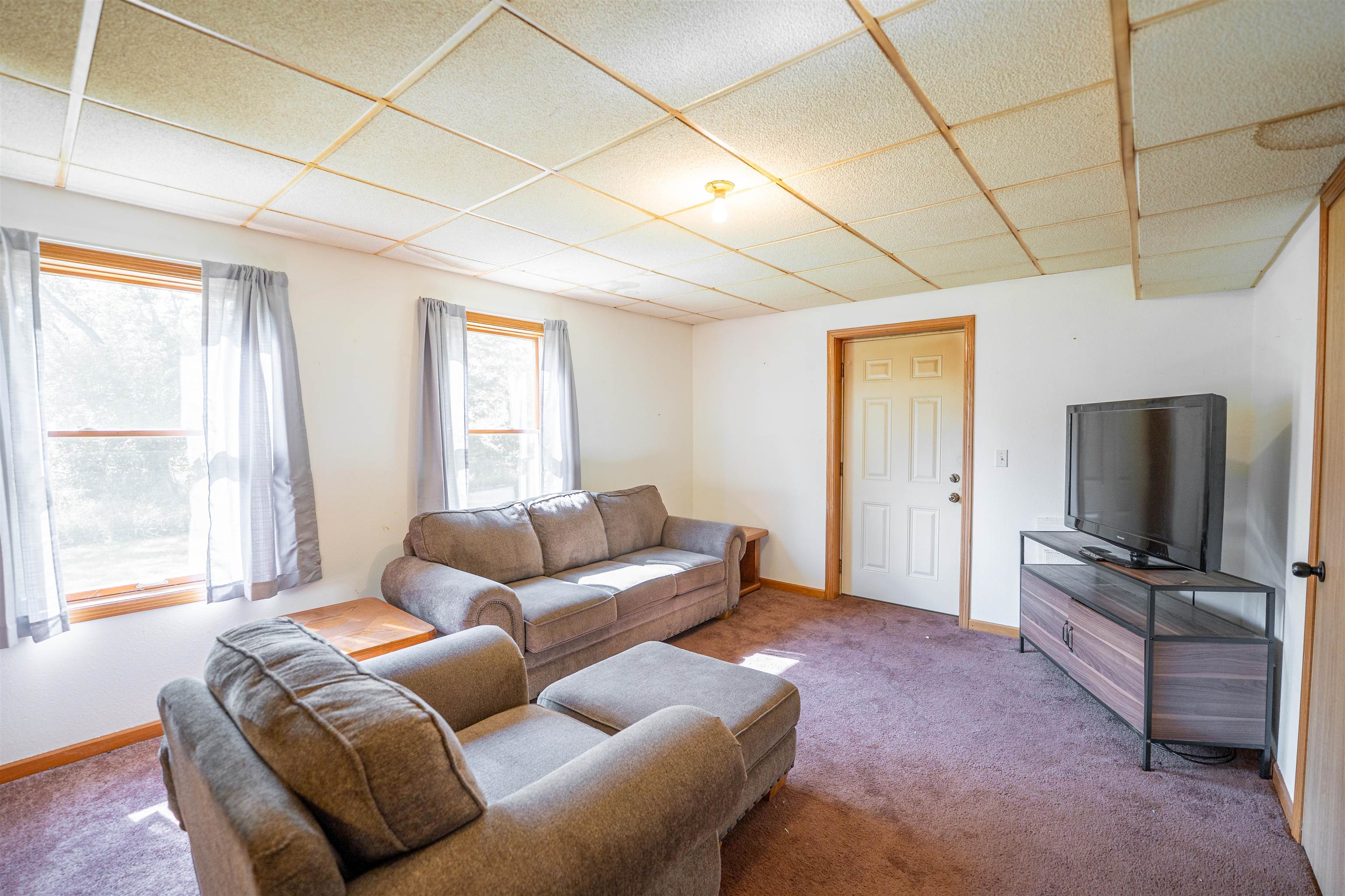 1912 Daysville Road Oregon, IL 61061 - Photo 47 of 74 a living room with furniture and a flat screen tv