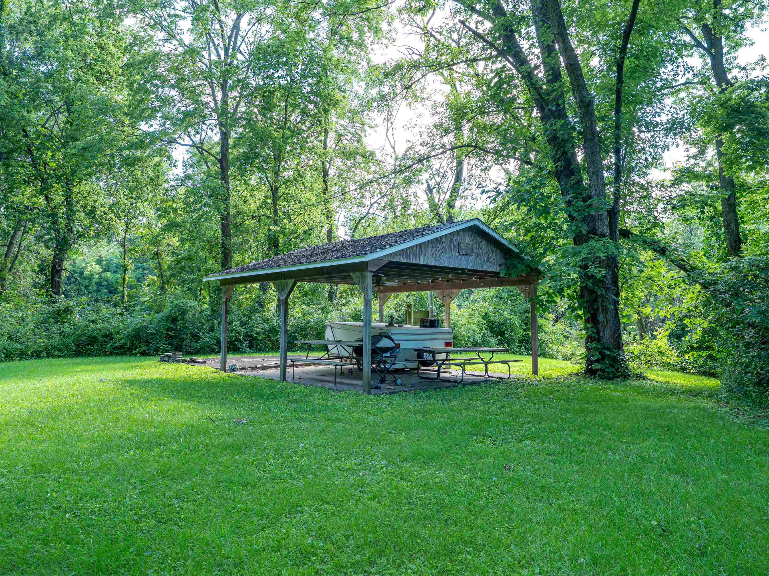 1912 Daysville Road Oregon, IL 61061 - Photo 56 of 74 a view of outdoor space with a garden and trees