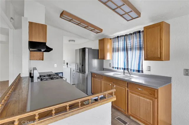 $84,900 | 16473 Green Tree Boulevard, Unit 21, Victorville, CA 92395