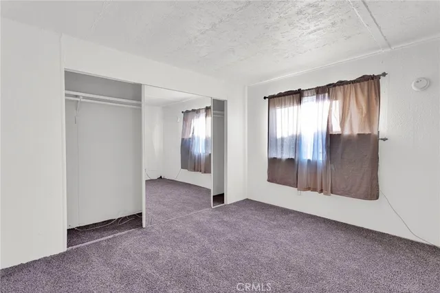 $84,900 | 16473 Green Tree Boulevard, Unit 21, Victorville, CA 92395