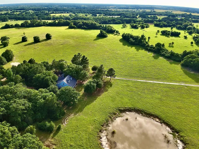 a view of a lake with a houses