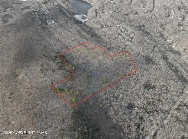 an aerial view of a tennis court