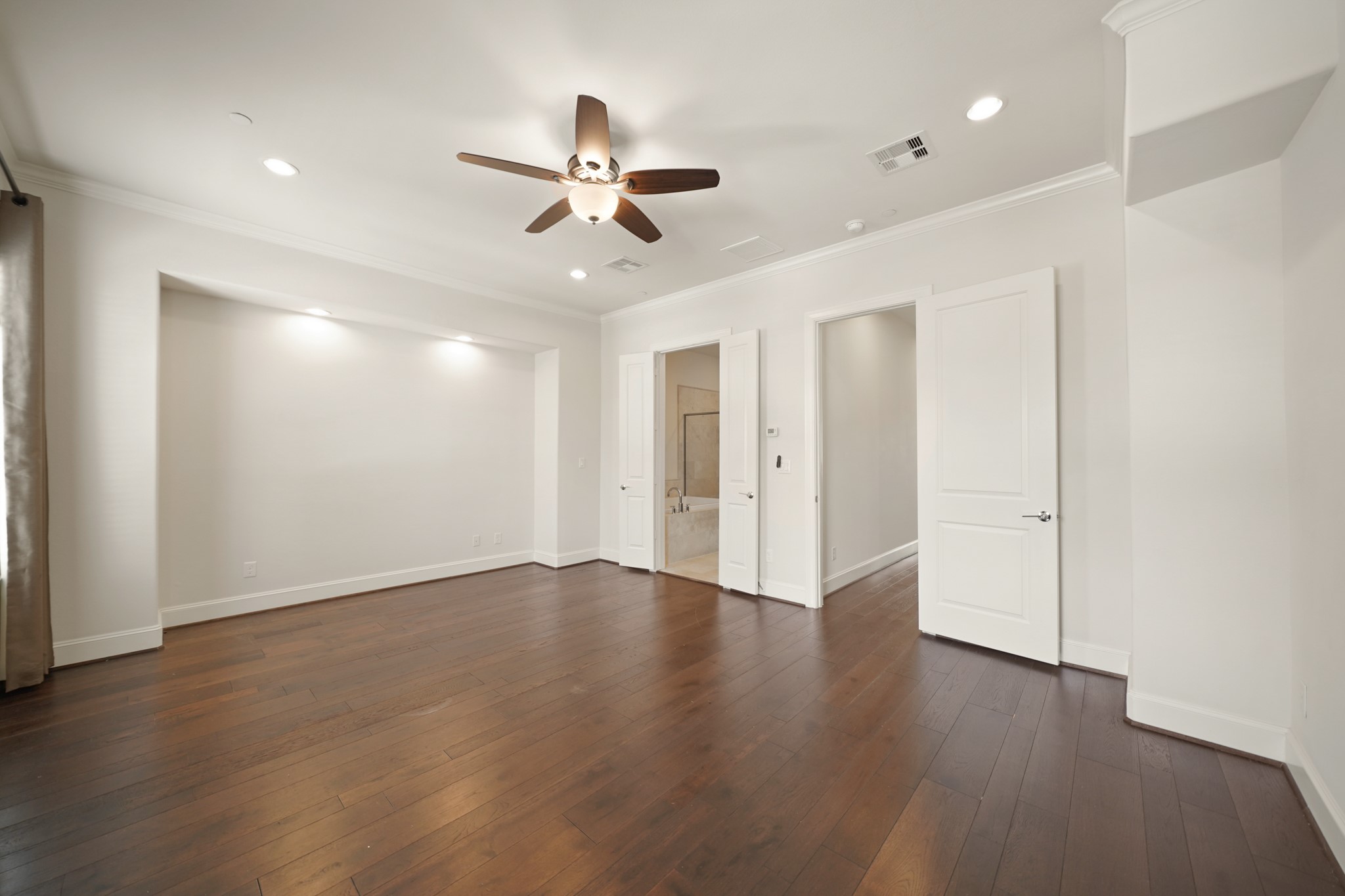 1317 Roy Street Houston, TX 77007 - Photo 20 of 50 A cozy recessed nook with reading lights is the perfect spot for your bed, creating a restful retreat.