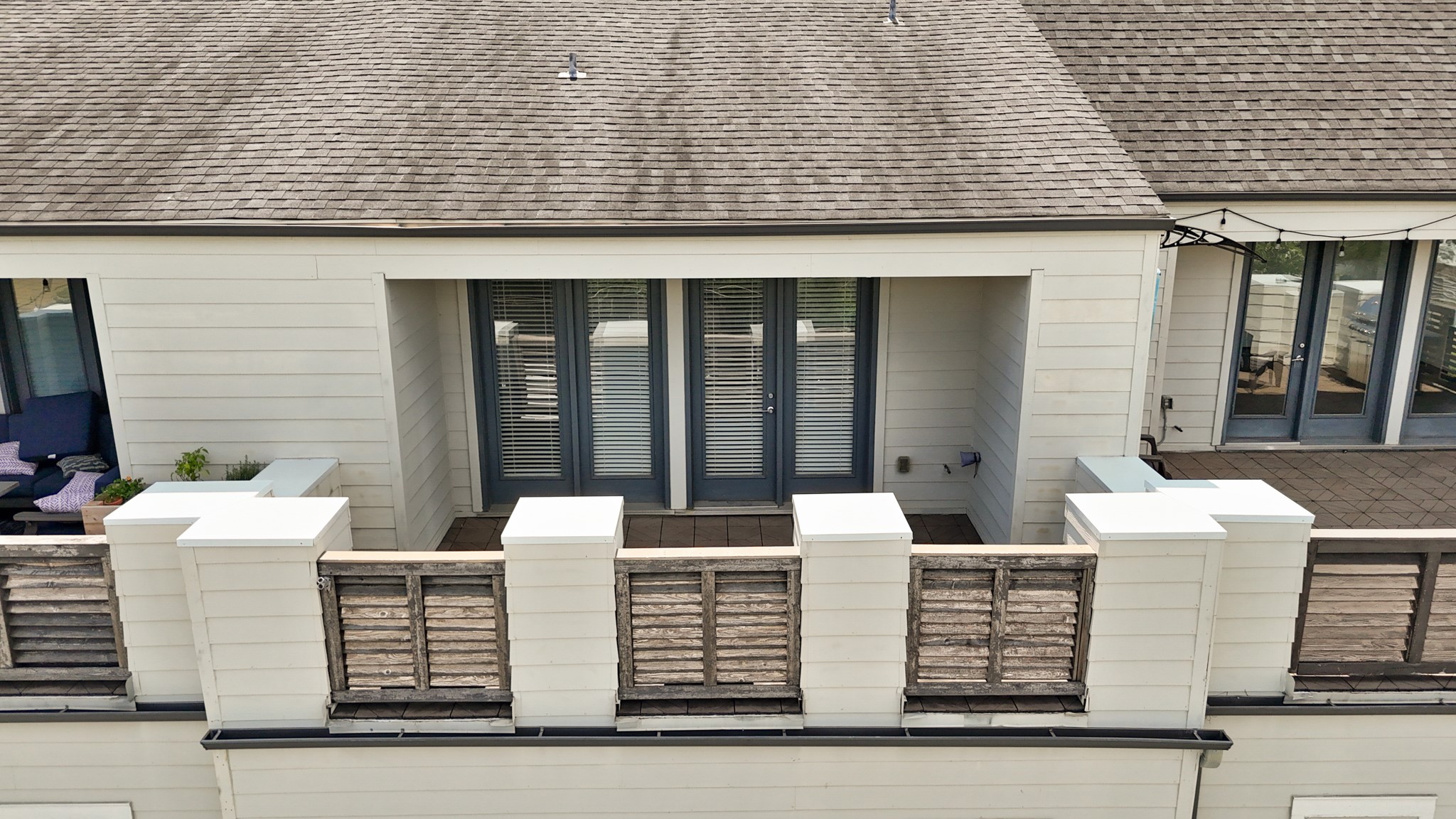 1317 Roy Street Houston, TX 77007 - Photo 36 of 50 The spacious fourth-floor terrace is designed to offer both relaxation and functionality. The floor is finished with rubber tile-style decking, giving it a clean look and durable surface for everyday use.
