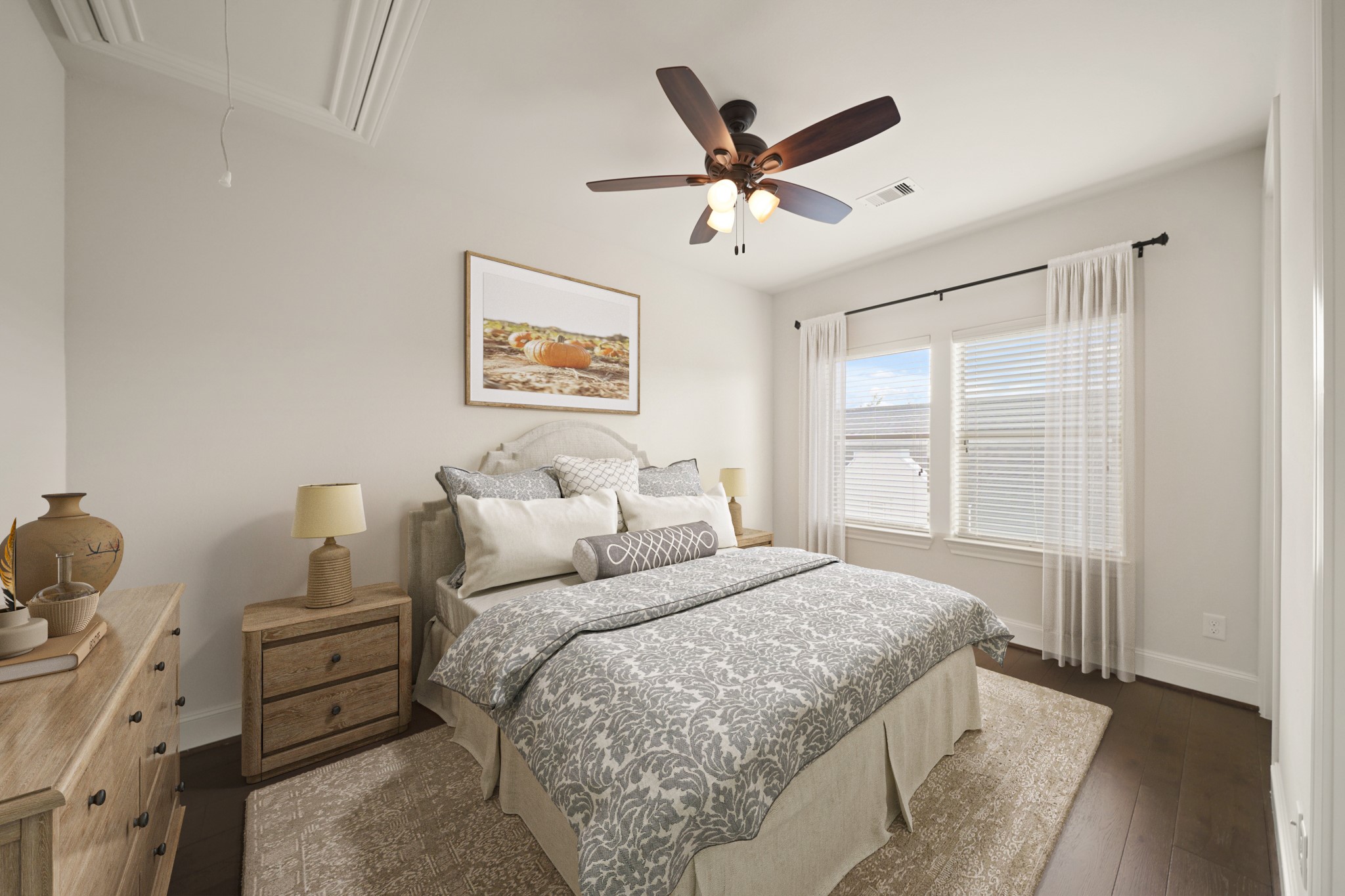 1317 Roy Street Houston, TX 77007 - Photo 41 of 50 The third bedroom features gleaming hardwood floors and a ceiling fan with light, creating a comfortable and inviting atmosphere. A large window fills the room with natural light, brightening the space. This room has been virtually staged.