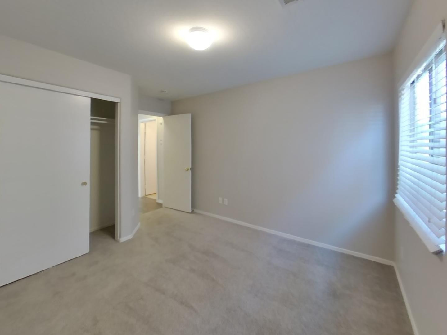 3194 West Tanner Ranch Road San Tan Valley, AZ 85144 - Photo 12 of 15 an empty room with windows