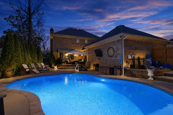 a view of a chairs and tables in patio