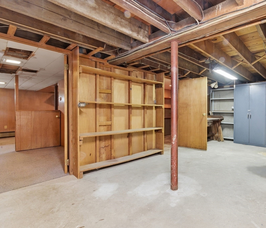188 Glendale Road Attleboro, MA 02703 - Photo 28 of 37 a view of an empty room with storage