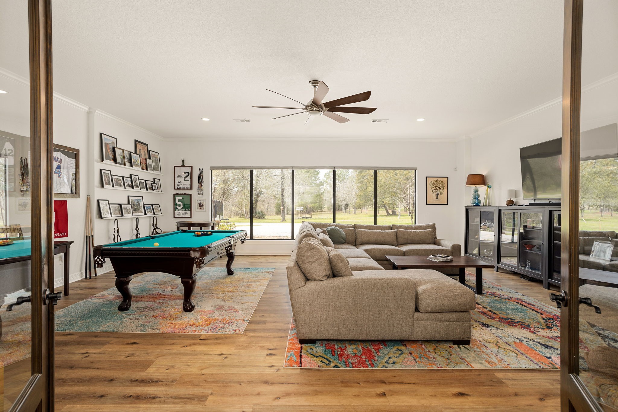 10210 Stidham Road Conroe, TX 77302 - Photo 23 of 39 a living room with furniture and a large window