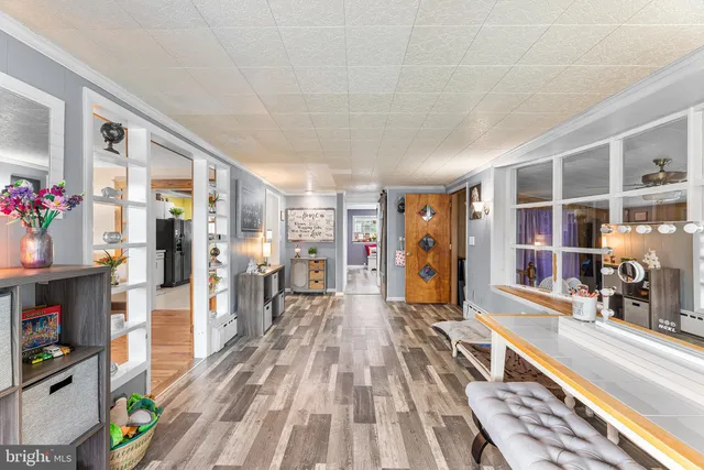 a bathroom with a sink mirror and vanity