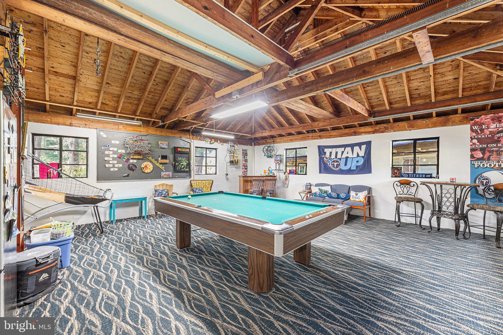 13241 Oyster House Road Princess Anne, MD 21853 - Photo 30 of 39 a outdoor space with a large pool table and chairs