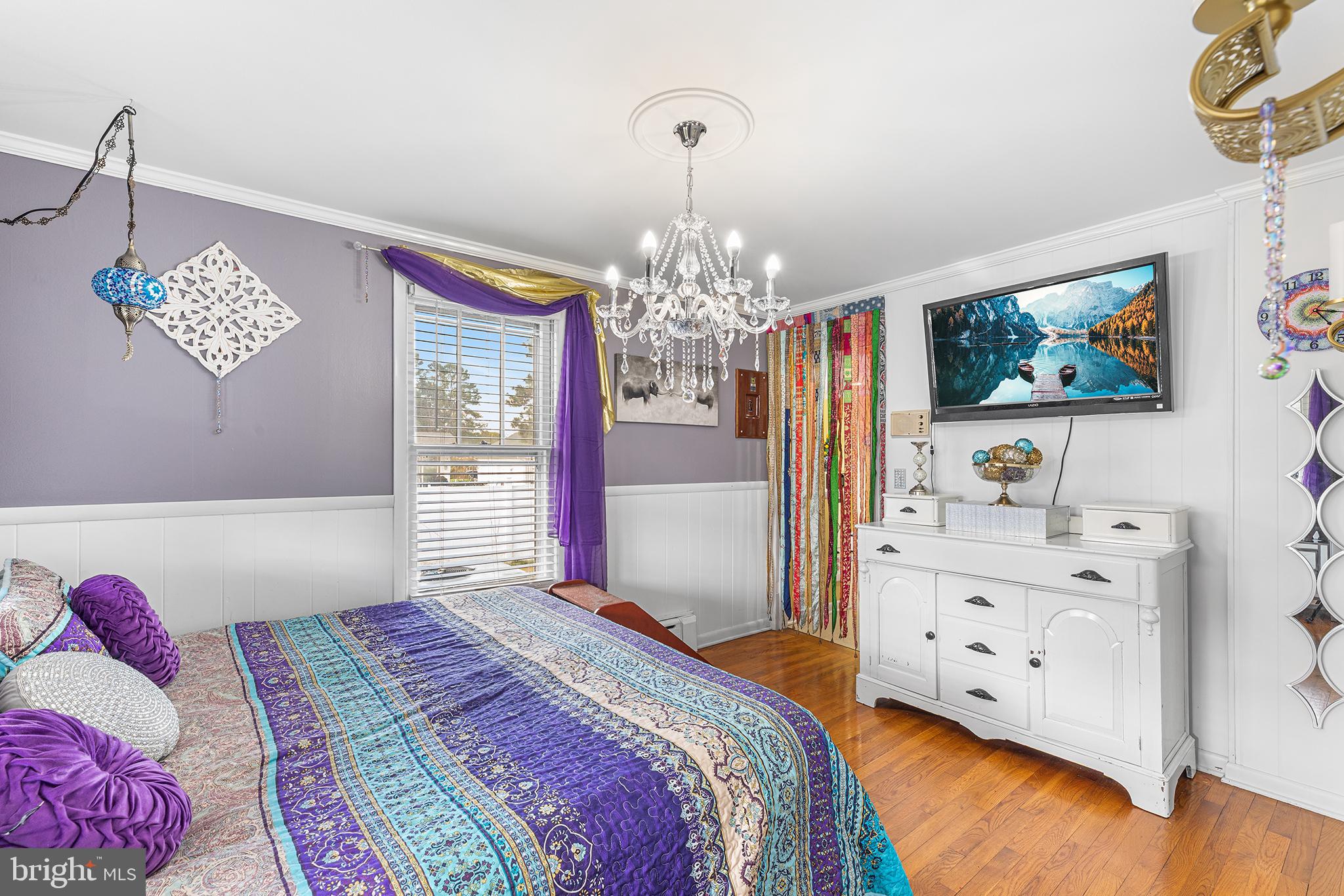 13241 Oyster House Road Princess Anne, MD 21853 - Photo 5 of 39 a bedroom with a bed dresser and a window