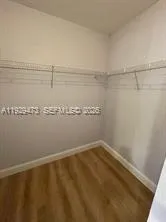 a view of a room with racks on the wall