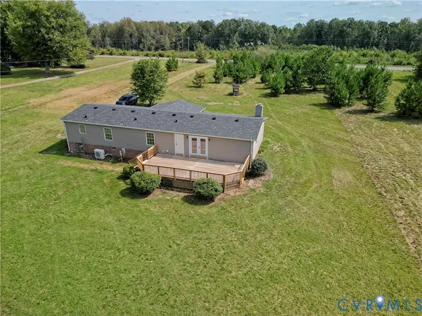a view of a lake with a yard