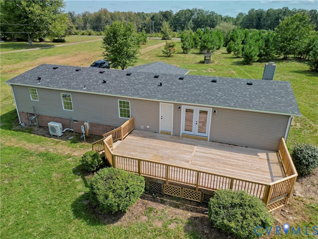 2110 Military Road Amelia Court House, VA 23002 - Photo 4 of 46 an aerial view of a house with a yard basket ball court and outdoor seating