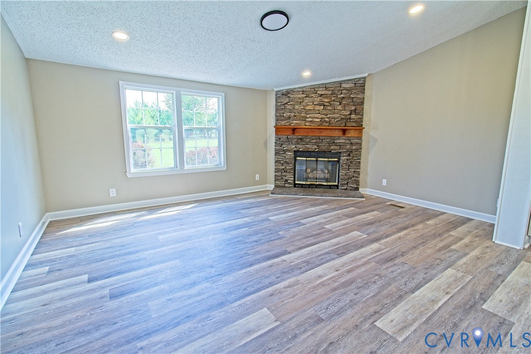 2110 Military Road Amelia Court House, VA 23002 - Photo 9 of 46 wooden floor in an empty room with a window